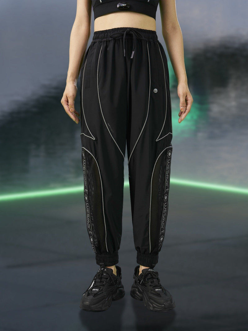 WESMART: Cyberpuck Striped Reflective Track Pants clottech